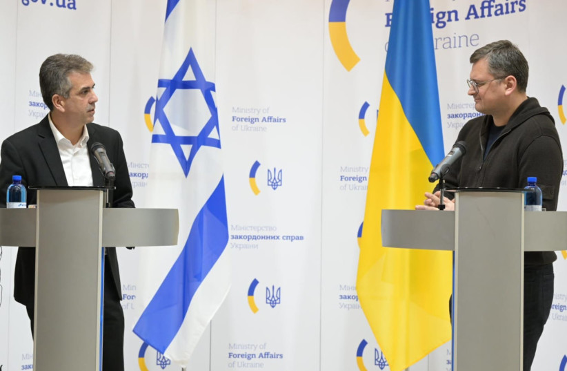  (L-R) Israeli Foreign Minister Eli Cohen and Ukrainian counterpart Dmytro Kuleba in Kyiv on February 16, 2023 (credit: SHLOMI AMSALEM/GPO)