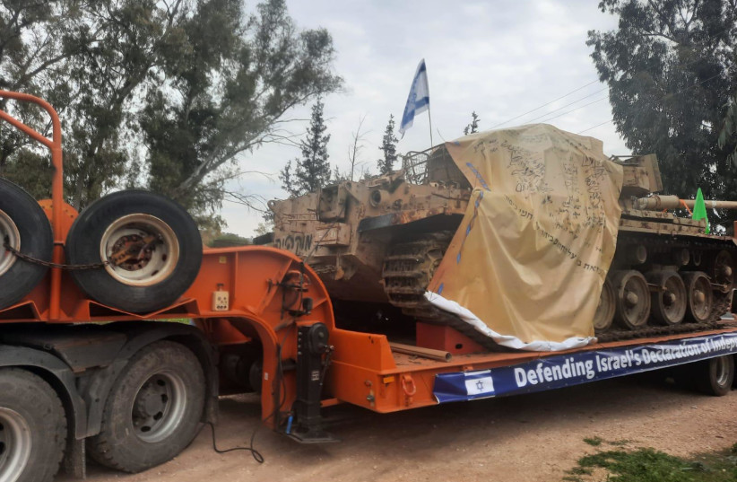  The tank that was stolen for a protest against the government and a copy of the Declaration of Indepence on it. (credit: ISRAEL POLICE SPOKESPERSON'S UNIT)