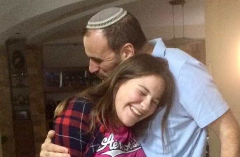  Photos show the late Gila Hammer with her father Rabbi Shalom Hammer. (credit: SHALOM HAMMER)