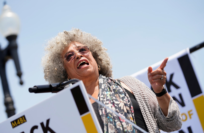  Professor Angela Davis speaks at a rally calling on Congress to censure President Donald Trump on Capitol Hill in Washington, US, April 30, 2019.  (credit: REUTERS/AARON P. BERNSTEIN)