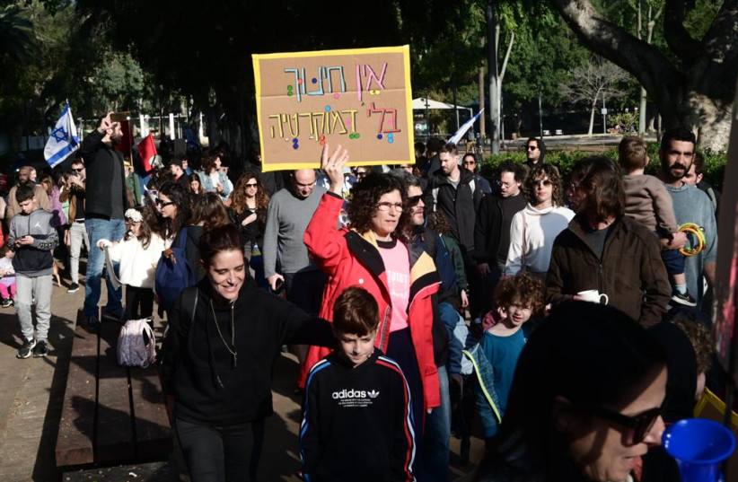  Children and their parents march in Tel Aviv in protest of the judicial reform. (photo credit: AVSHALOM SASSONI/MAARIV)