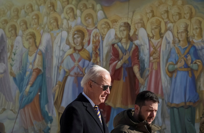  U.S. President Joe Biden and Ukraine's President Volodymyr Zelenskiy walk next to Saint Michael’s cathedral (photo credit: REUTERS)
