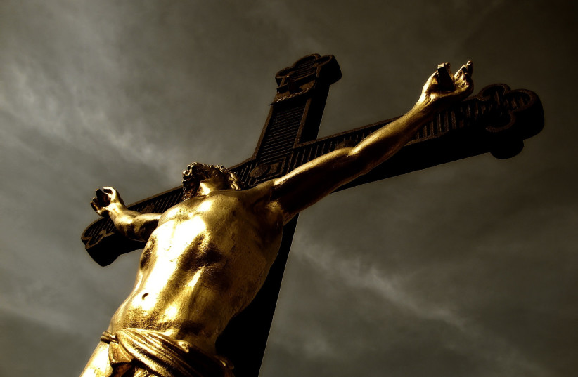  Jesus Christ, the Christian Messiah, is seen crucified on a cross in this artistic rendering. (photo credit: PIXABAY)
