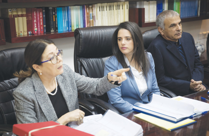  SUPREME COURT President Esther Hayut gestures, as then-justice minister Ayelet Shaked looks on and then-finance minister Moshe Kahlon listens during a meeting of the Judicial Selection Committee, in 2018.  (photo credit: HADAS PARUSH/FLASH90)