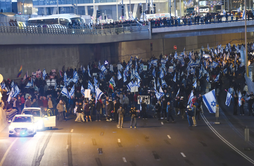  PROTESTERS RALLY on the Ayalon Highway against the Netanyahu government, last week. Genuinely committed and genuinely stupid people think that interfering with traffic is a legitimate way to express an opinion, says the writer. (photo credit: GILI YAARI/FLASH90)