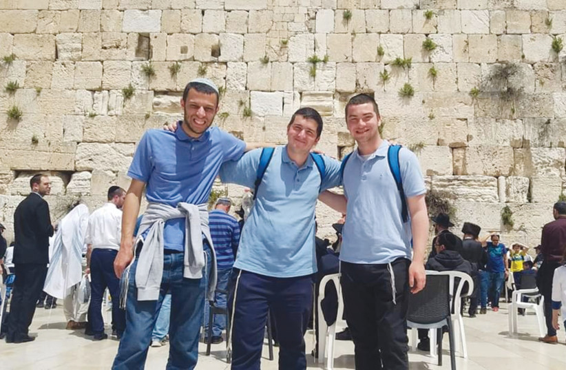  FRIENDS AT Yeshivat Darkaynu visit the Western Wall. (photo credit: Courtesy/Avi Ganz)