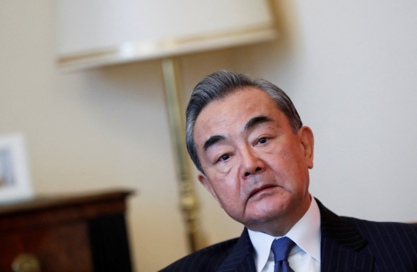  China's Director of the Office of the Central Foreign Affairs Commission Wang Yi meets with Hungarian Foreign Minister Peter Szijjarto (not seen) in Budapest, Hungary, February 20, 2023 (credit: REUTERS/BERNADETT SZABO)