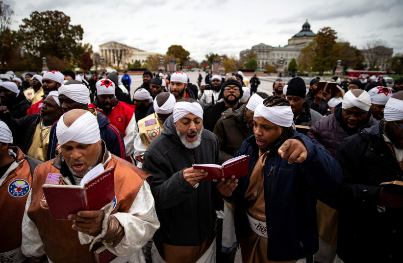 Members of the Black Hebrew Israelites demonstrate outside the US Capitol in Washington, US, November 13, 2018. (photo credit: REUTERS/Al Drago)