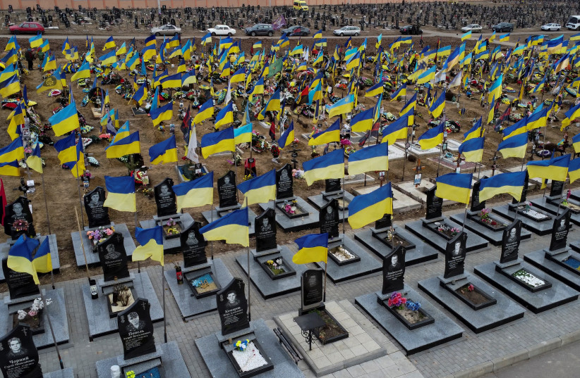  A view shows graves of killed Ukrainian defenders, amid Russia's attack on Ukraine, at a cemetery in Kharkiv, Ukraine January 31, 2023. (credit: REUTERS/Vitalii Hnidyi)