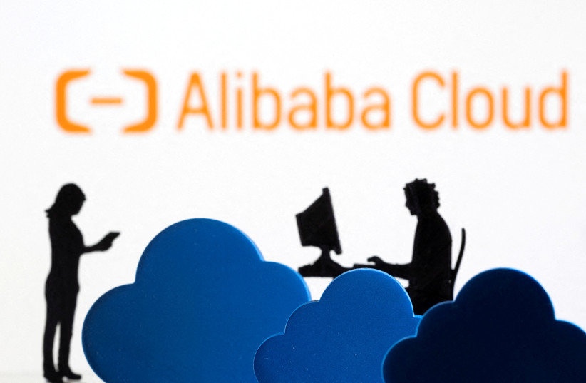  3D printed clouds and figurines are seen in front of the Alibaba Cloud service logo in this illustration taken February 8, 2022.  (photo credit: DADO RUVIC/REUTERS ILLUSTRATION)