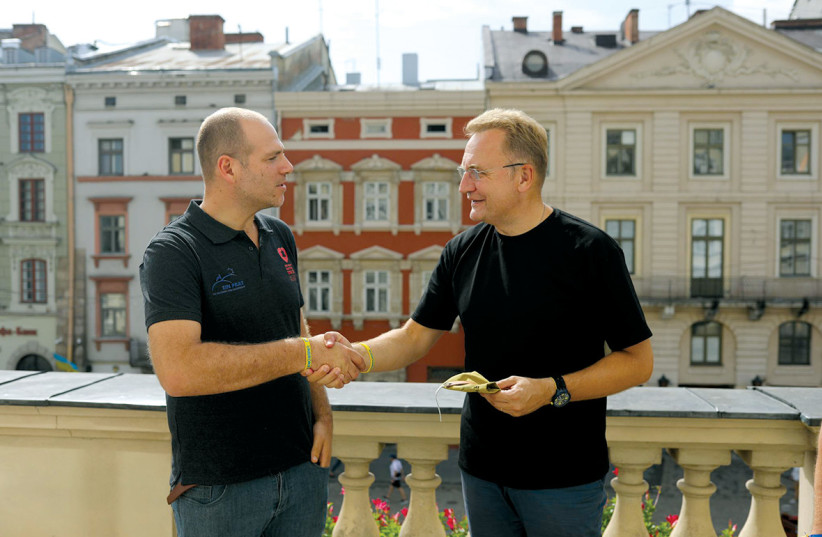  Lev Echad CEO Tomer Dror and Lviv Mayor Andriy Sadovyi. (photo credit: TOMER DROR)