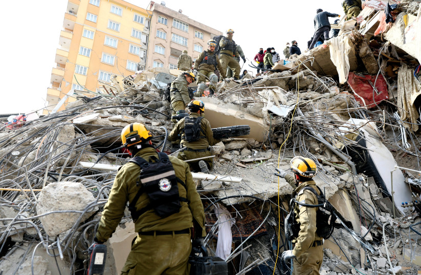  Members of an IDF team search for earthquake survivors in Kahramanmaras, Turkey, on February 10. (credit: RONEN ZVULUN/REUTERS)