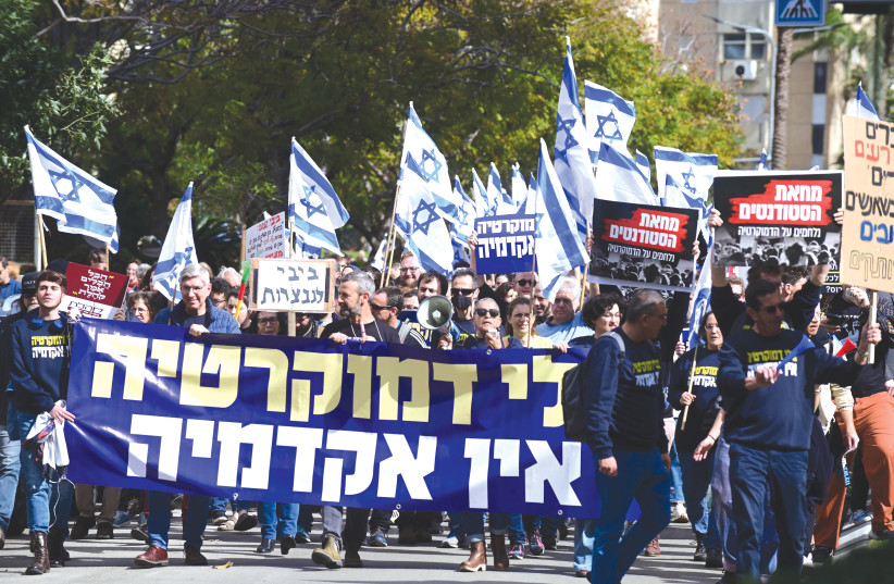  AT A demonstration in Tel Aviv, earlier this month, against the government’s plan for judicial change, signs read ‘The student protest’ and ‘Without democracy, there is no academia.’ (credit: TOMER NEUBERG/FLASH90)