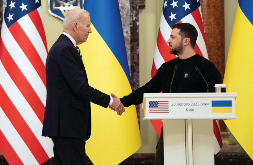  US PRESIDENT Joe Biden and Ukrainian President Volodymyr Zelensky shake hands after delivering statements in Kyiv, on Monday. Zelensky and Biden often talk as though NATO and Ukraine are one, though that’s not the case, says the writer.  (credit: Evan Vucci/REUTERS)