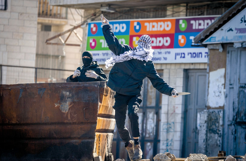  SCENES OF clashes between residents of Isawiya and security forces on Sunday. (credit: YONATAN SINDEL/FLASH90)
