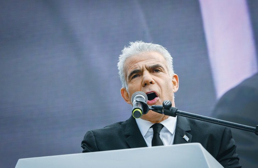  OPPOSITION LEADER MK Yair Lapid addresses a rally protesting the government’s plan for a judicial overhaul, outside the Knesset, earlier this month. (credit: Arie Leib Abrams/Flash90)