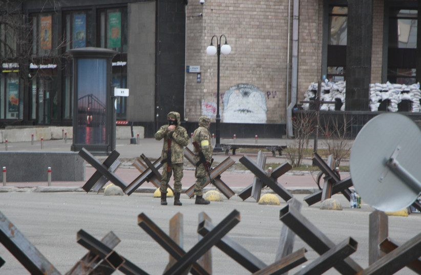 ‘CZECH HEDGEHOGS,’ anti-tank obstacles, are seen along the main streets of Kyiv, with firing positions in the adjacent buildings, in March 2022.  (photo credit: JONATHAN SPYER)