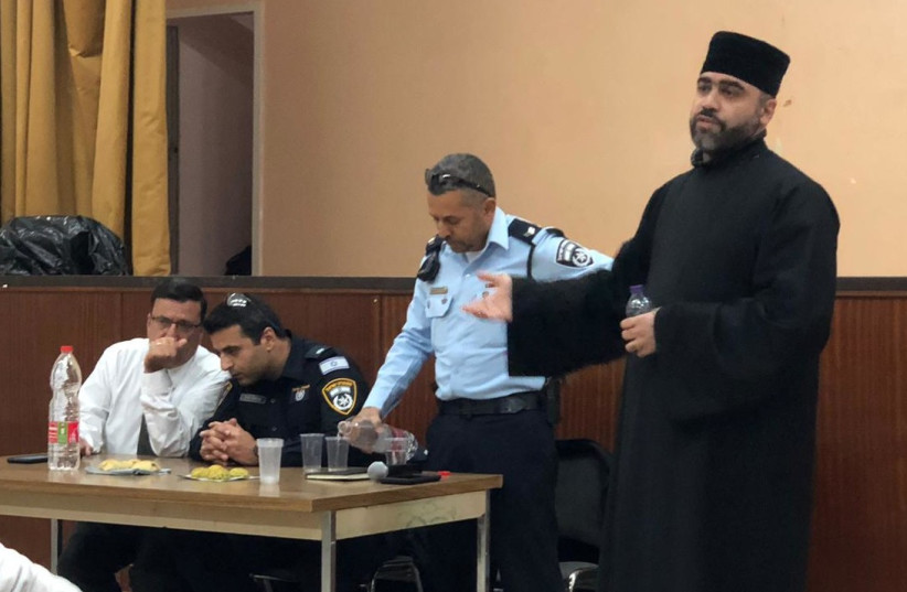 Police officers from Jerusalem’s David precinct meet with representatives of the Armenian community and clergy. (photo credit: POLICE SPOKESPERSON'S UNIT)