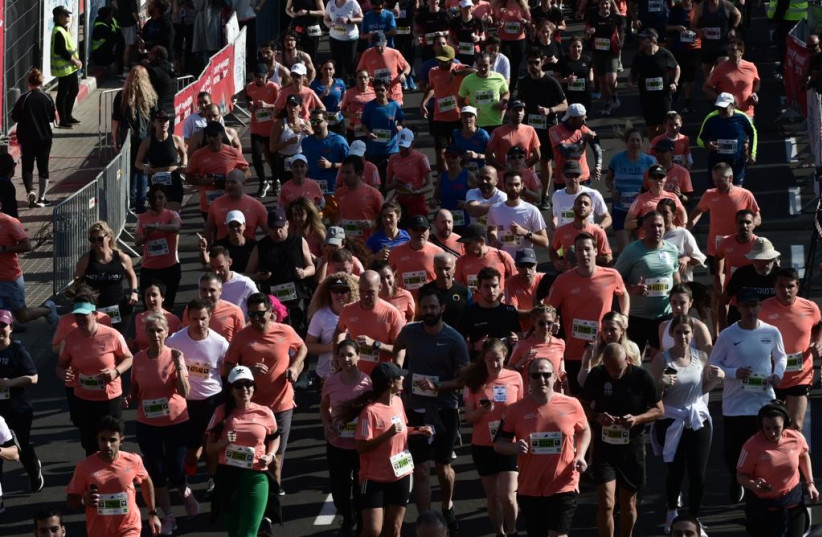  Thousands participated in the Tel Aviv Marathon. (credit: AVSHALOM SASSONI/MAARIV)