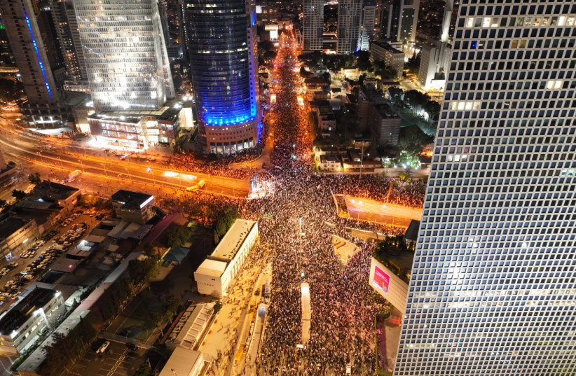  Thousands of Israeli protestors seen protesting on Kaplan interchange in Tel Aviv on Saturday, February 25, 2023 (credit: OR HADAR)