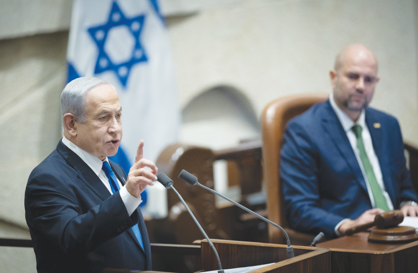 PRIME MINISTER Benjamin Netanyahu addresses the Knesset plenum. ‘The executive sits in the legislature and dominates it.’ (photo credit: YONATAN SINDEL/FLASH90)