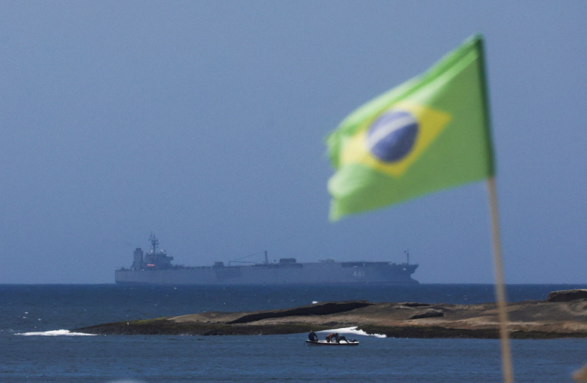 Iranian military ship Iris Makran navigates on the coast of Rio de Janeiro as a Brazilian flag flutters in Copacabana Beach, Brazil, February 27, 2023. (photo credit: REUTERS/RICARDO MORAES)