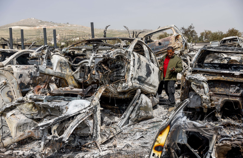  View of cars burned by Jewish settlers during riots last night in Huwara, in the West Bank, near Nablus, February 27, 2023 (credit: ERIK MARMOR/FLASH90)