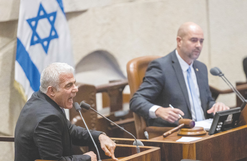  OPPOSITION LEADER MK Yair Lapid addresses the Knesset last week. It seems that if there were a competition for the most divisive senior politician in Israel’s history, Lapid would be the undisputed winner by a large margin, says the writer. (photo credit: YONATAN SINDEL/FLASH90)