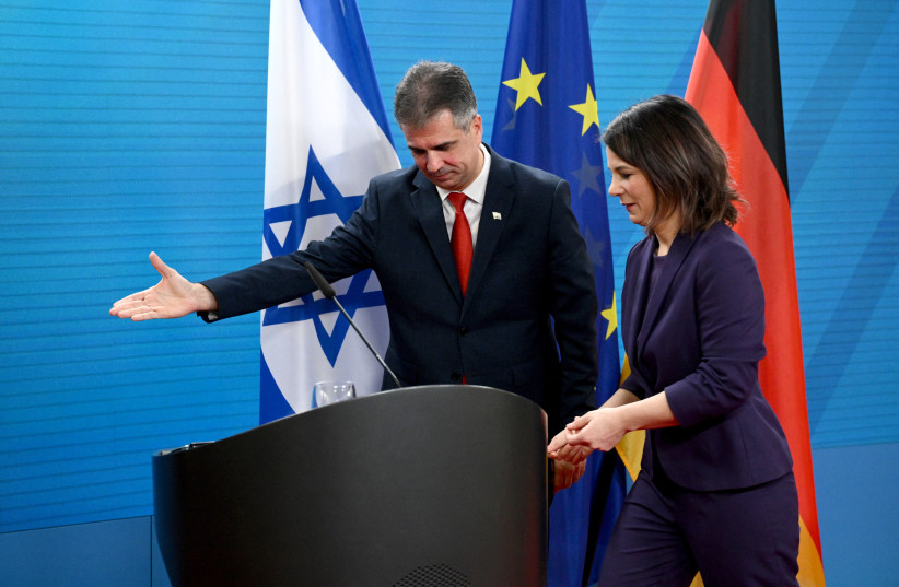  German Foreign Minister Annalena Baerbock and Israeli Foreign Minister Eli Cohen shake hands as they speak to reporters in Berlin, Germany, February 28, 2023 (credit: REUTERS/ANNEGRET HILSE)