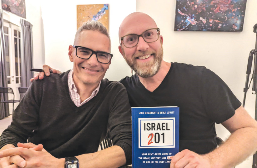 JOEL CHASNOFF (left) and Benji Lovitt at a book launch event.  (photo credit: BENJI LOVITT)