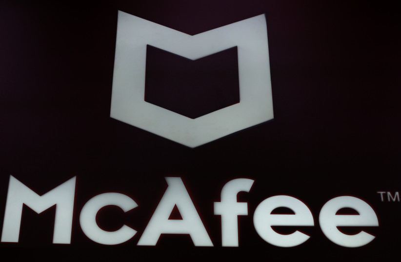  The McAfee logo is displayed at the Mobile World Congress (MWC) in Barcelona on February 25, 2019. (photo credit: PAU BARRENA/AFP VIA GETTY IMAGES)