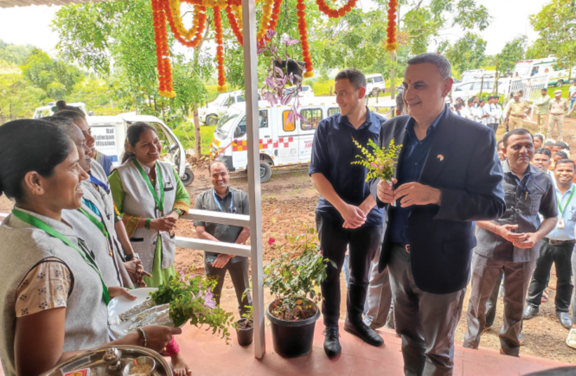  ISRAELI CONSUL-GENERAL in Mumbai, Kobbi Shoshani, receives a traditional welcome on his visit to GPM projects in Mokhada. (credit: GPM)