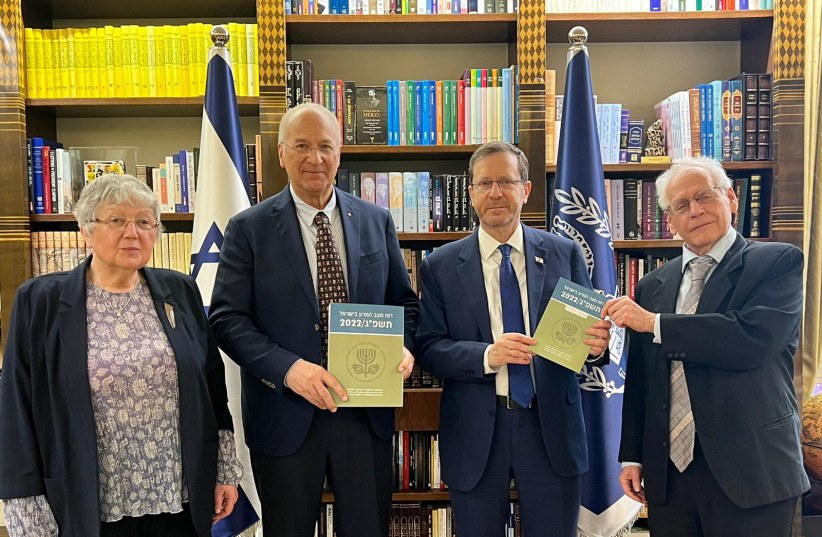  From left: Prof. Margalit Finkelberg, Prof. David Harel, President Isaac Herzog and Prof. Reshef Tenne, submitting the Science in Israel 2018/2022 to the President in his office. (credit: GPO)