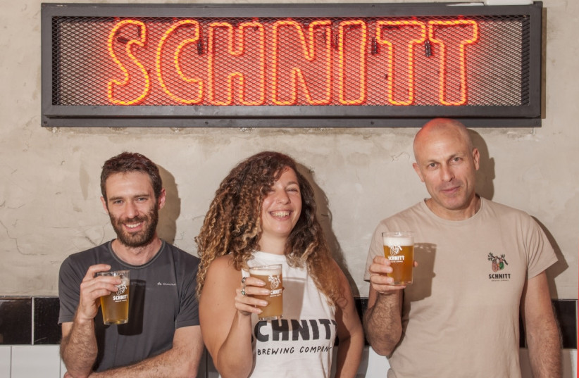  THREE MEMBERS of the Schnitt crew in TLV: (from L) Brewmaster Alon Schwartz; marketing director Yarden Peled; and partner/owner Amir Neuman. (credit: MIKE HORTON)