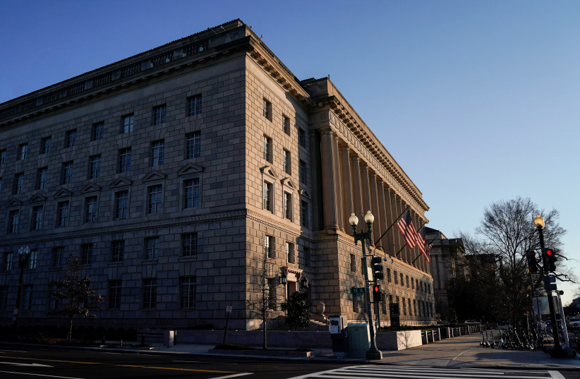 The Department of Commerce building is seen before an expected report of new home sales numbers in Washington, US, January 26, 2022. (photo credit: REUTERS/JOSHUA ROBERTS)