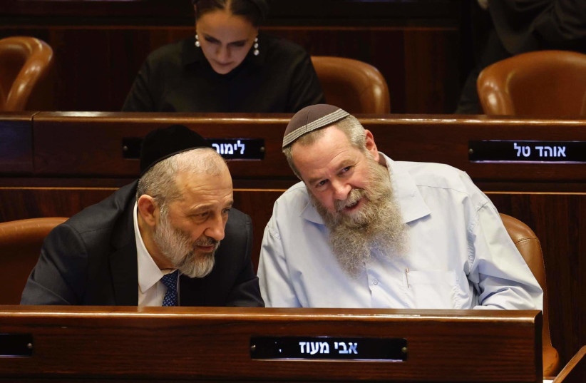  Noam party leader Avi Maoz sits with Shas leader Arye Deri in the Knesset plenum, March 1, 2023 (photo credit: MARC ISRAEL SELLEM/THE JERUSALEM POST)
