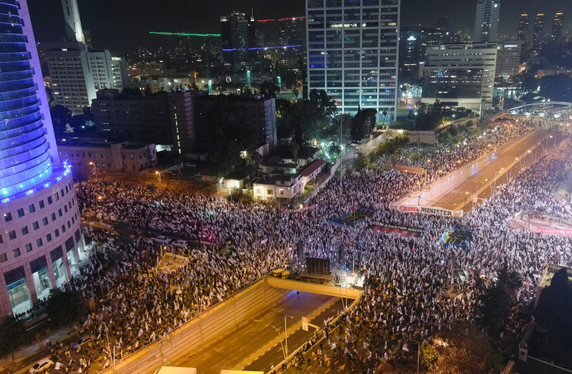 An aerial view shows Israelis demonstrating as Israeli Prime Minister Benjamin Netanyahu's nationalist coalition government presses on with its contentious judicial overhaul, in Tel Aviv, Israel March 4, 2023. (credit: REUTERS/ILAN ROSENBERG)
