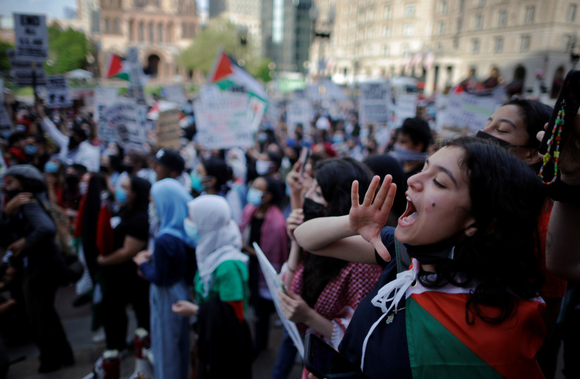  Demonstrators chant during a pro-Palestinian rally, amid a flare-up of Israeli-Palestinian violence, in Boston, Massachusetts, US, May 18, 2021. (credit: REUTERS/BRIAN SNYDER)