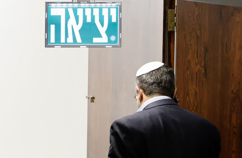 National Security Minister Itamar Ben-Gvir exits the Knesset plenum, March 6, 2023. (photo credit: MARC ISRAEL SELLEM/THE JERUSALEM POST)