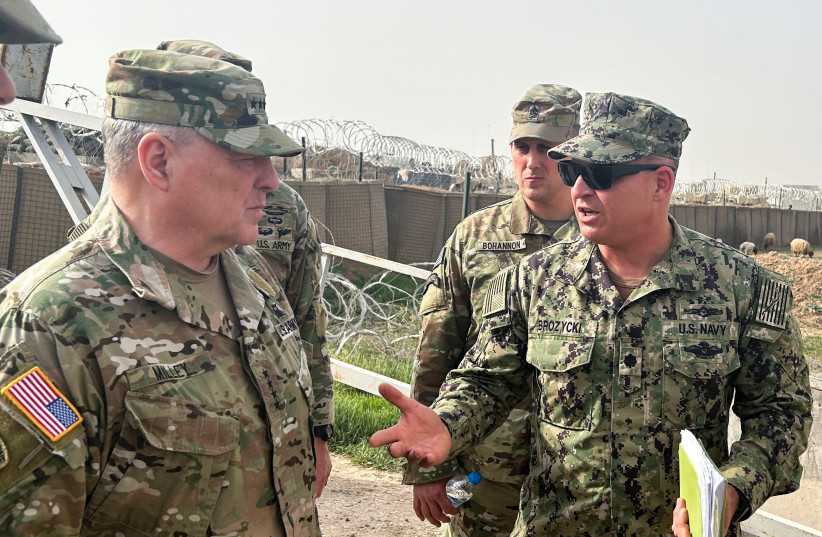  US Joint Chiefs Chair Army General Mark Milley speaks with US forces in Syria during an unannounced visit, at a US military base in Northeast Syria, March 4, 2023.  (credit: REUTERS/PHIL STEWART)