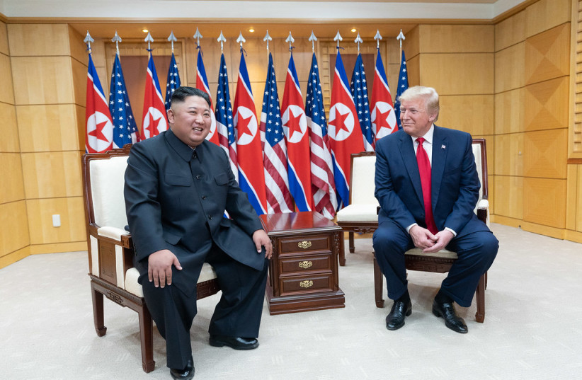  Former US President Donald Trump meets with Kim Jong Un (photo credit: FLICKR)