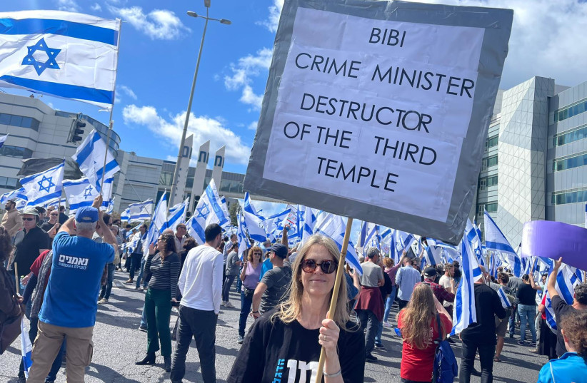  Israelis protest the judicial reform at the southern entrance to Haifa on March 9, 2023. (photo credit: YOAV ETIEL/WALLA!)