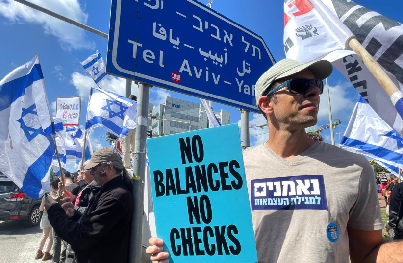  Israeli protesters gather at Haifa's Intel building to demonstrate against the judicial reforms on March 9, 2023.  (credit: YOAV ETIEL/WALLA!)
