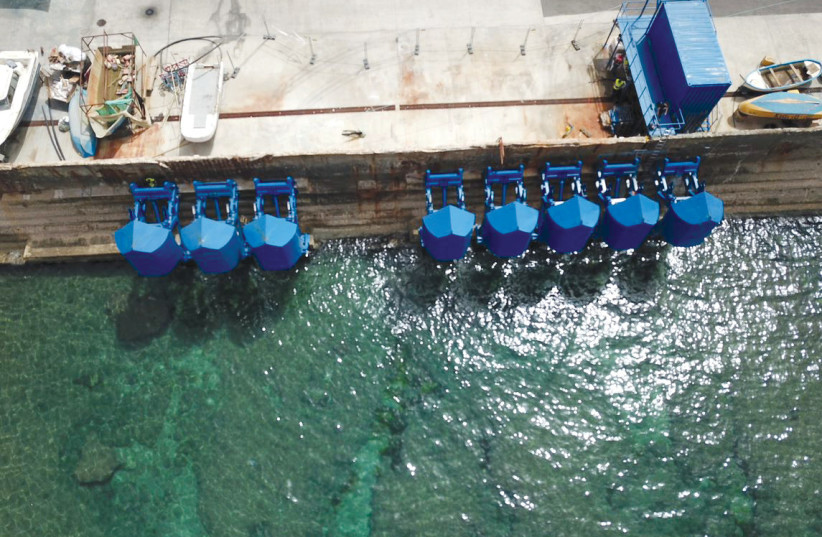  Floaters off the breakwater at Jaffa Port. (photo credit: Eco Wave Power)