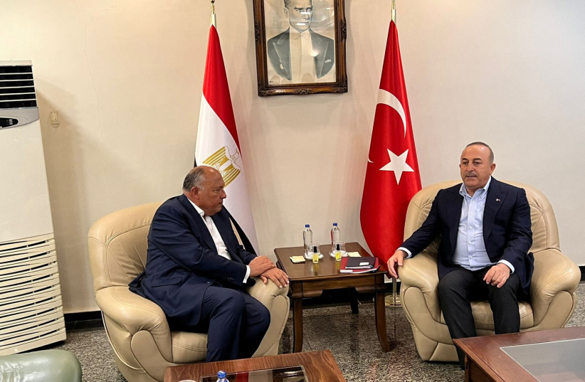  TURKISH FOREIGN MINISTER Mevlut Cavusoglu (R) meets with Egyptian counterpart Sameh Shoukry in Mersin, Turkey, Feb. 27.  (credit: Egyptian Foreign Ministry/Handout via Reuters)