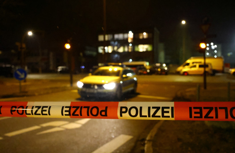  A view of a police tape at the scene following a deadly shooting, in Hamburg, Germany, March 10, 2023. (credit: Fabrizio Bensch/Reuters)