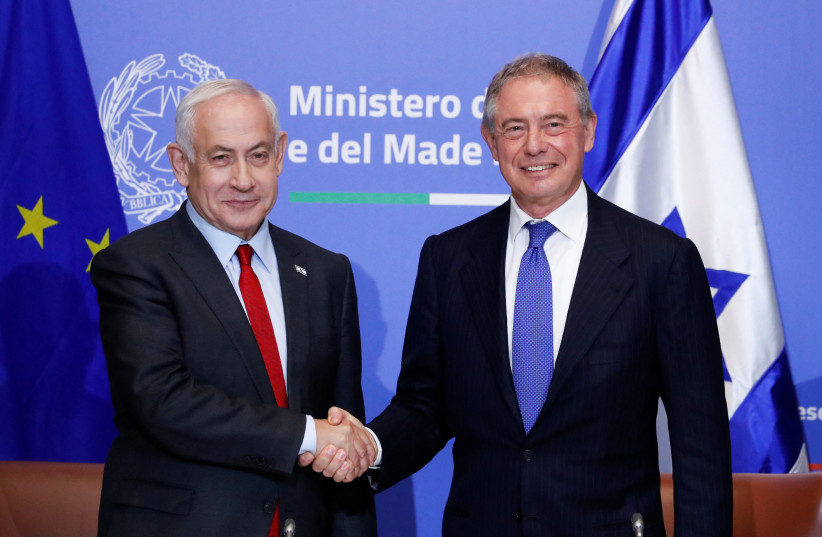  Israeli Prime Minister Benjamin Netanyahu shakes hands with Italy's Minister for Industry and Made in Italy Adolfo Urso, in Rome, Italy, March 10, 2023. (photo credit: REMO CASSILI/REUTERS)