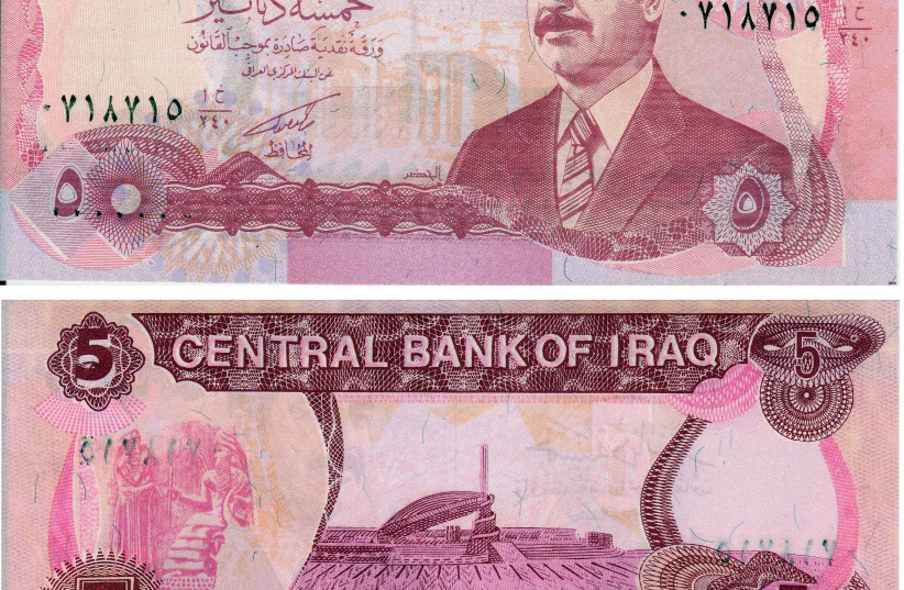  A bank note from Iraq with a picture of Saddam Hussein. (credit: IAN BARBOUR/FLICKR)