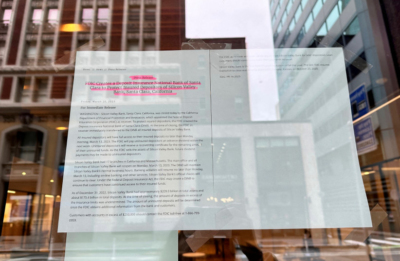  A notice hangs on the door of Silicon Valley Bank (SVB) located in San Francisco, California, U.S. March 10, 2023.  (credit: REUTERS/KRYSTAL HU)