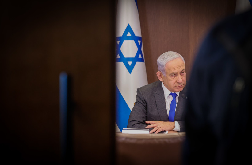 Prime Minister Benjamin Netanyahu attends a weekly cabinet meeting, March 12, 2023. (photo credit: MARC ISRAEL SELLEM/THE JERUSALEM POST)